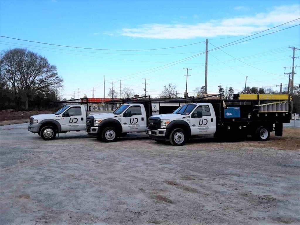 Piedmont and Greenville Garage Door Company Upstate Door Co photo of all trucks