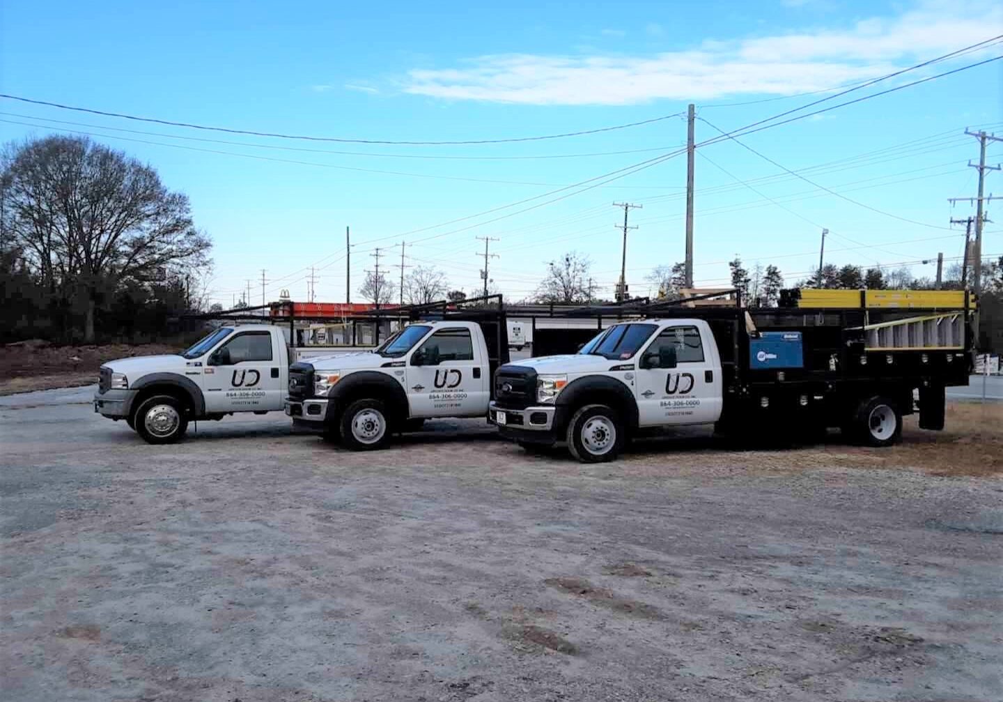 Piedmont and Greenville Garage Door Company Upstate Door Co photo of all trucks